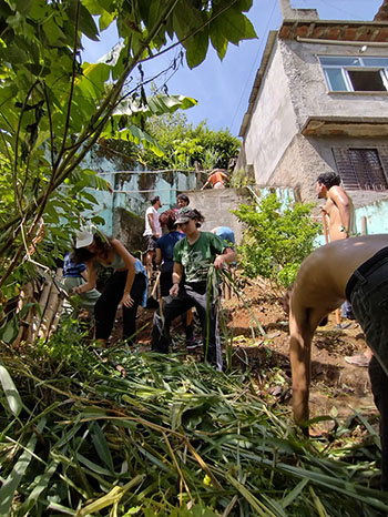 people gardening in a dense urban area